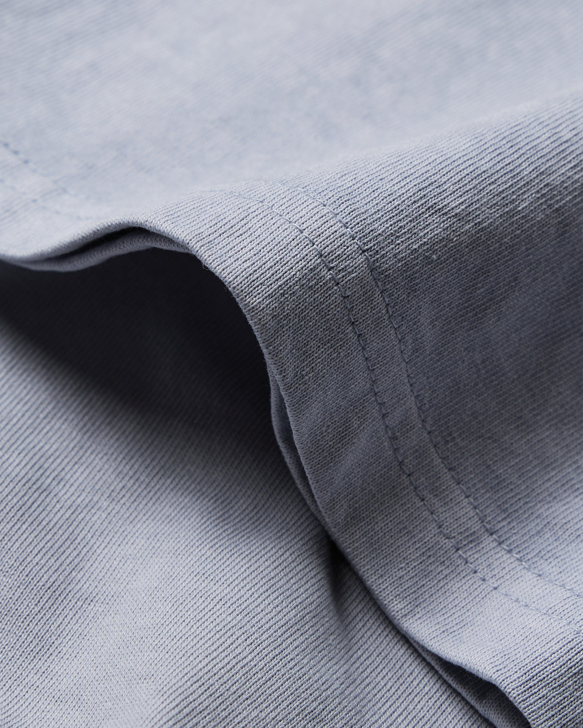 Close-up of gray fabric with a textured pattern