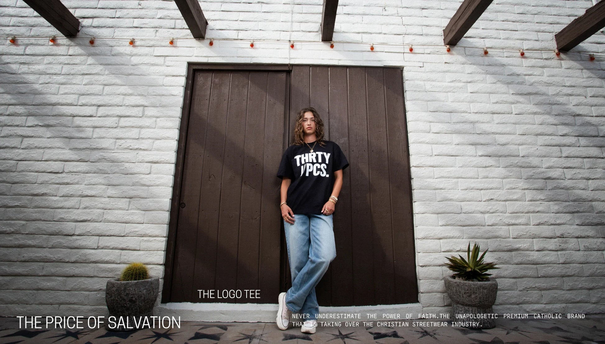 Thrty Pcs logo black tee on female model